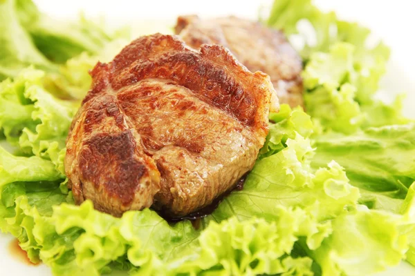 Steak with lettuce — Stock Photo, Image