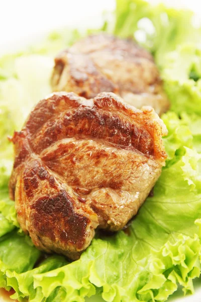 Steak with salad leaves — Stock Photo, Image