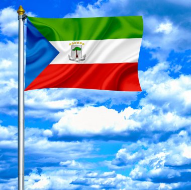 Equatorial Guinea waving flag against blue sky