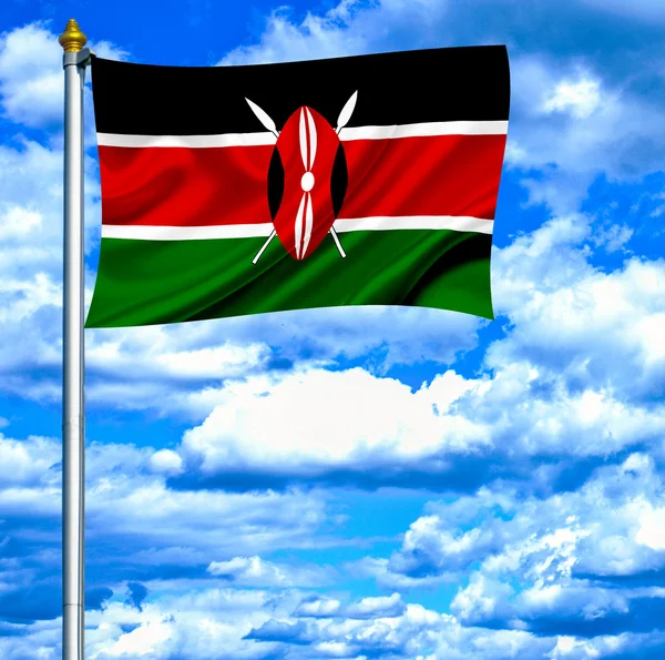 Kenia macha flagą przeciw błękitne niebo — Zdjęcie stockowe