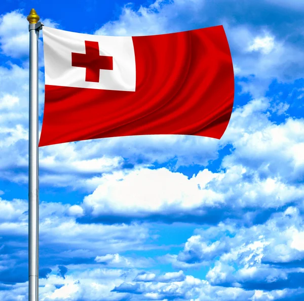 Tonga macha flagą przeciw błękitne niebo — Zdjęcie stockowe