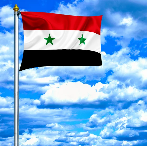 Syria macha flagą przeciw błękitne niebo — Zdjęcie stockowe