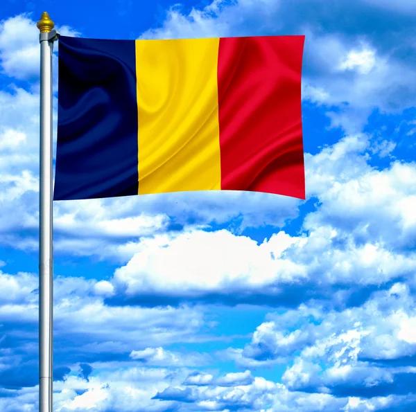 Chad ondeando bandera contra el cielo azul —  Fotos de Stock