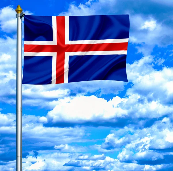 Island mává vlajkou proti modré obloze — Stock fotografie