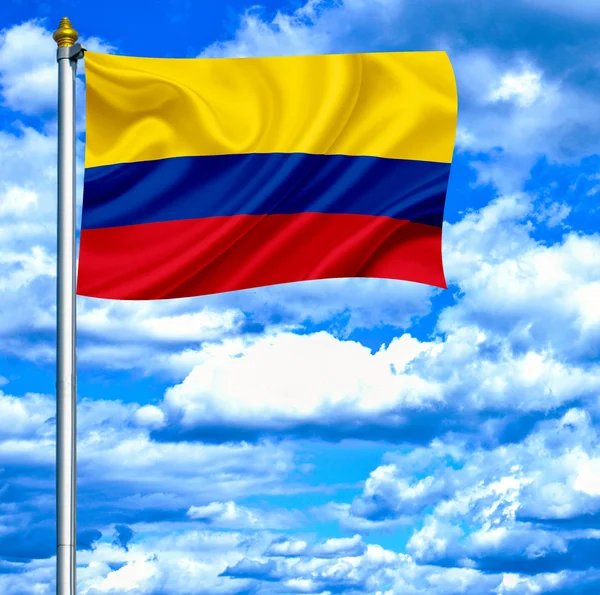 Kolumbien schwenkt Flagge gegen blauen Himmel — Stockfoto