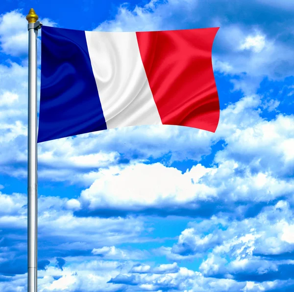 Frankrijk zwaaien vlag tegen blauwe hemel — Stockfoto
