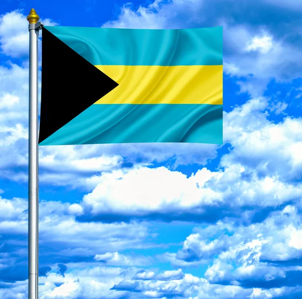 Bahamas waving flag against blue sky — Stock Photo, Image