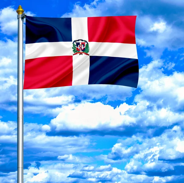 Домініканська Республіка, розмахуючи прапором проти синього неба — стокове фото