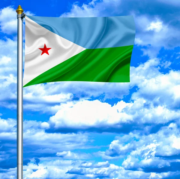 Dijbouti zwaaien vlag tegen blauwe hemel — Stockfoto