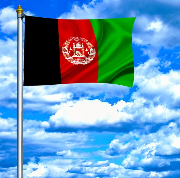 Afghánistán mává vlajkou proti modré obloze — Stock fotografie