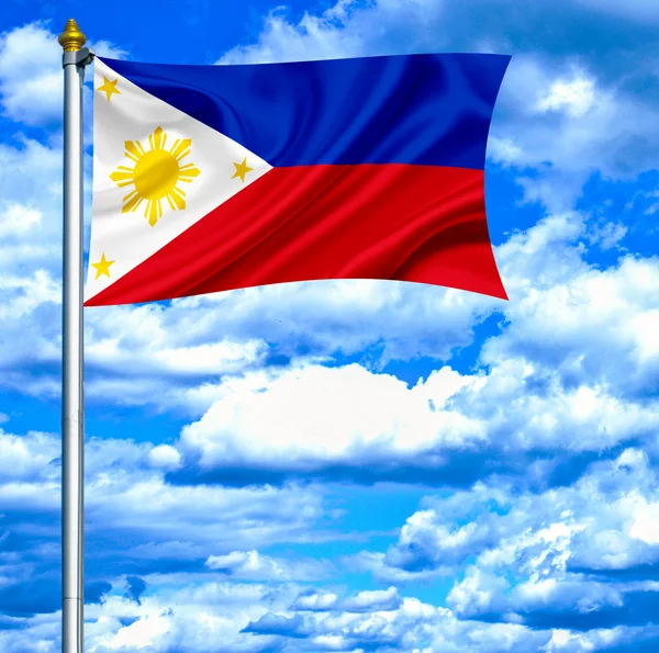 Filipinas ondeando bandera contra el cielo azul — Foto de Stock