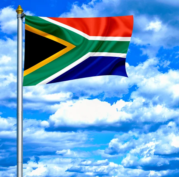 Jižní Afrika mává vlajkou proti modré obloze — Stock fotografie