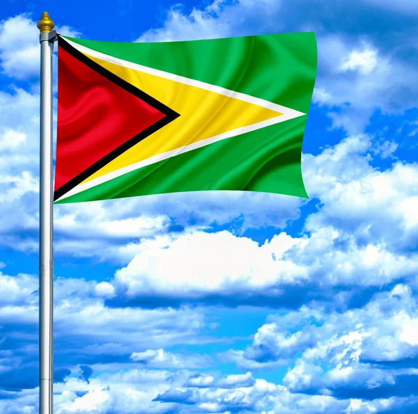 Guyana ondeando bandera contra el cielo azul — Foto de Stock