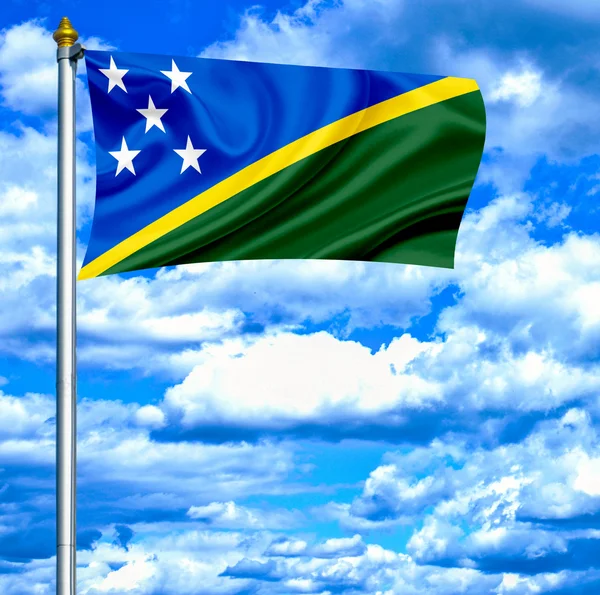 Solomon Adaları Mavi gökyüzü karşı bayrak sallayarak — Stok fotoğraf
