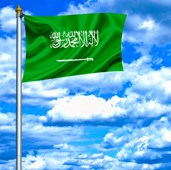 Saudi Arabia waving flag against blue sky — Stock Photo, Image