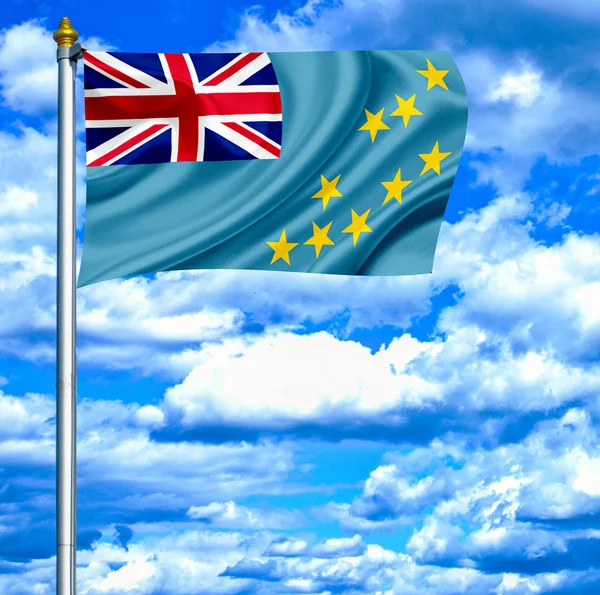 Tuvalu schwenkt Flagge gegen blauen Himmel — Stockfoto