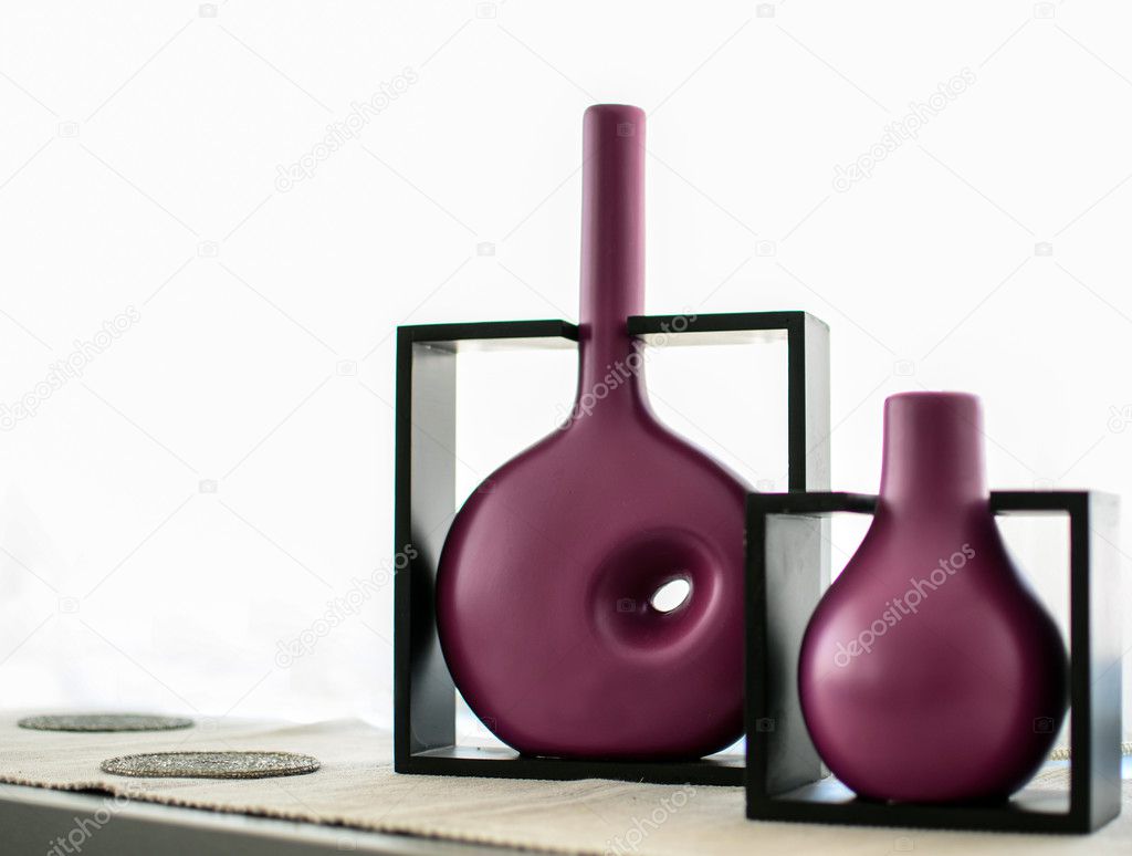 Modern vases on shelf