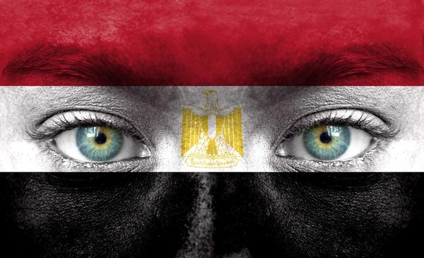 Human face painted with flag of Egypt — Stock Photo, Image
