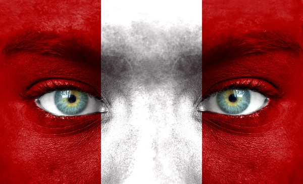 Human face painted with flag of Peru — Stock Photo, Image