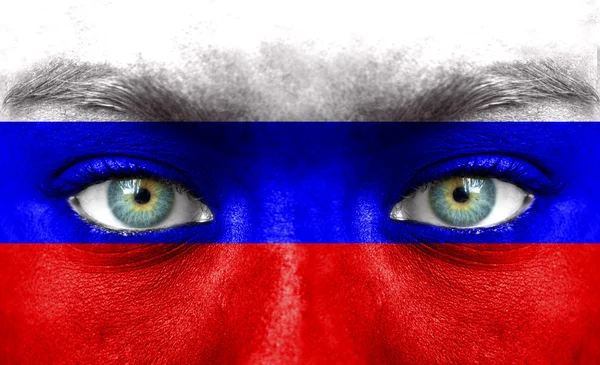 Cara humana pintada con bandera de Rusia — Foto de Stock