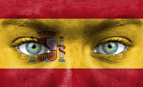 Lidská tvář s vlajkou Španělska — Stock fotografie
