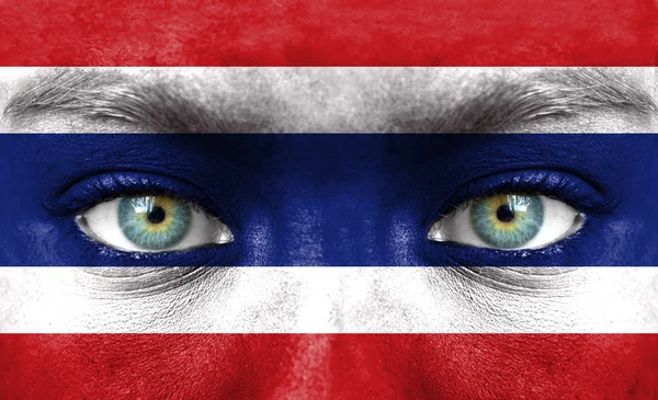 Cara humana pintada con bandera de Tailandia — Foto de Stock