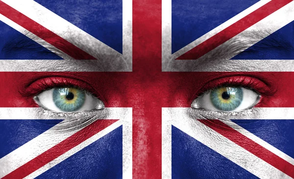 Rosto humano pintado com bandeira do Reino Unido — Fotografia de Stock