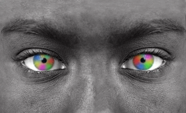 Lidská tvář s barevné oční extrémní detail — Stock fotografie