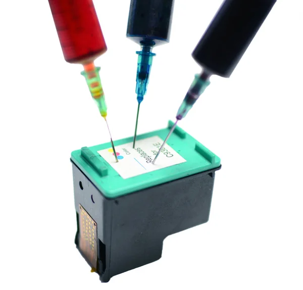 Three syringes in ink catridge — Stock Photo, Image