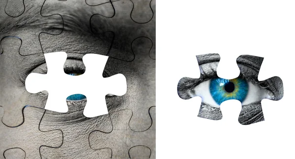 Ojo humano azul con piezas de rompecabezas —  Fotos de Stock
