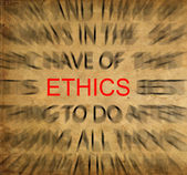 Blured text on vintage paper with focus on ETHICS