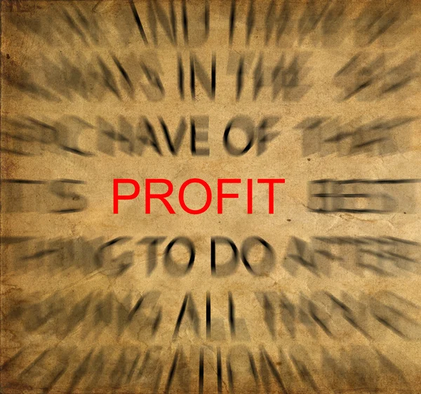 stock image Blured text on vintage paper with focus on PROFIT