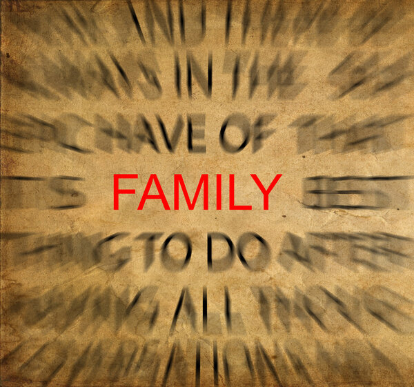Blured text on vintage paper with focus on FAMILY