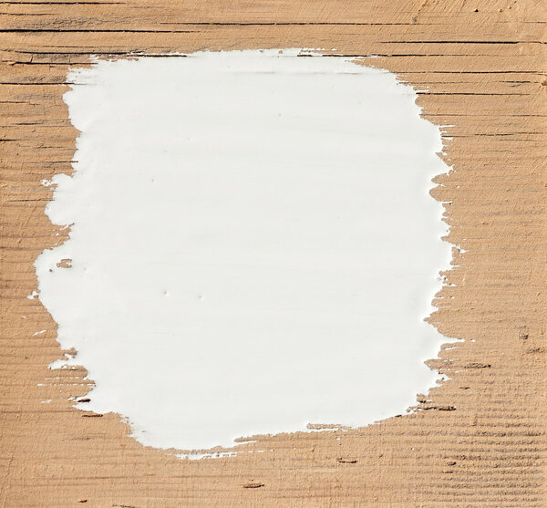 White stroke paint on old wooden background