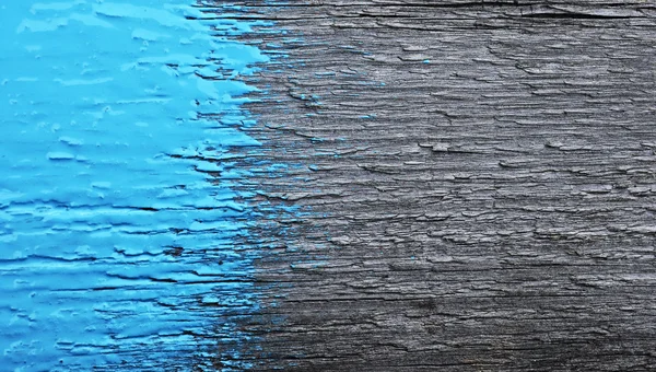 Vernice blu su vecchio sfondo di legno — Foto Stock