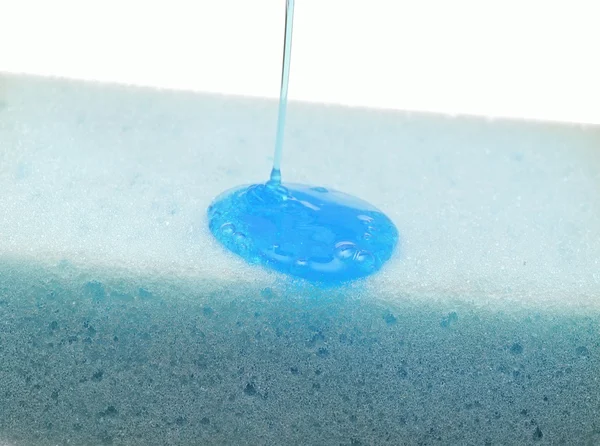 Closeup sponge and soap gel, isolated on white — Stock Photo, Image