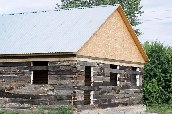 stock image Unfinished wooden house and building area