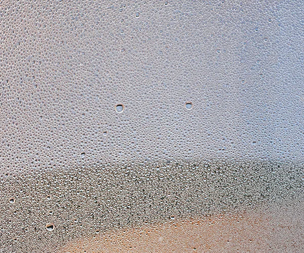 Colorido muitas gotas de água no fundo — Fotografia de Stock