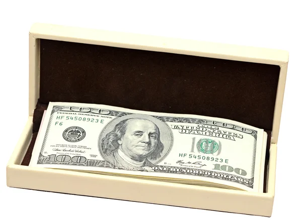 Hromadu dolarů v žluté krabičky na bílém pozadí — Stock fotografie