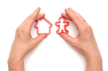 Hands and a model home and man clipart