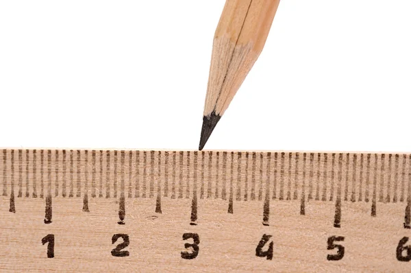 Ruler and wood pencil on white — Stock Photo, Image
