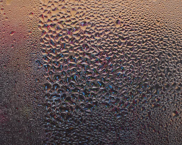 Waterdruppels abstracte levendige kleuren achtergrond — Stockfoto