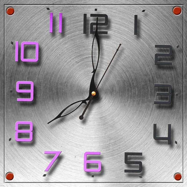 Modern clock on circular metal brushed texture — Stock Photo, Image