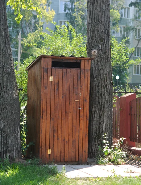 Small wooden outdoors toilet in summer. — Stock Photo, Image
