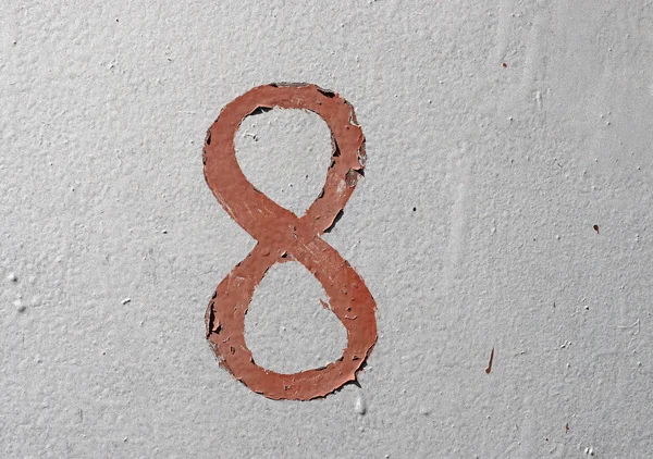 8 - old brown handwritten number over grunge silver background — Stock Photo, Image