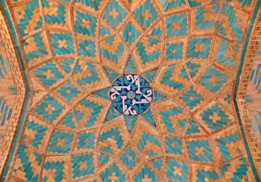 Brickwork mixed with blue tiles inside a mosque clipart