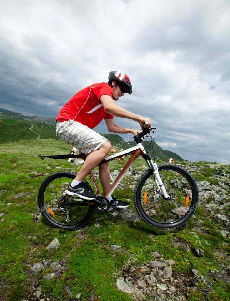 A man riding a mountain bike