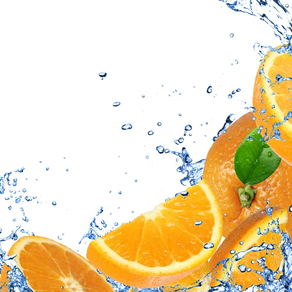 Fresh healthy fruit background with splashing water — Stock Photo, Image