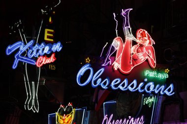 Erotic neon lights in Red light district in Pattaya clipart