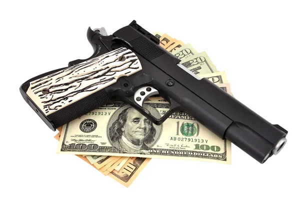 Pistola e dollari — Foto Stock